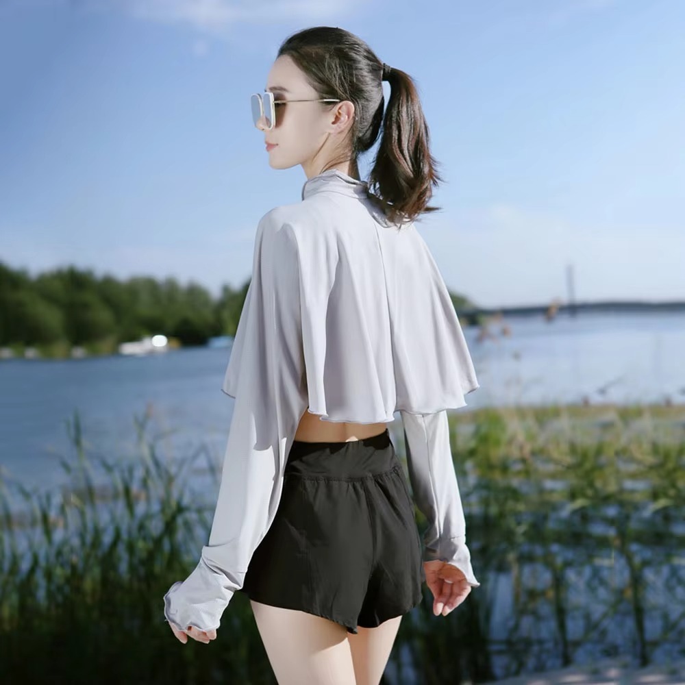 Nouvelle cape de protection solaire décontractée pour femme, couleur unie, respirante, à manches longues, en soie glacée fine, pour l'été et les activités de plein air