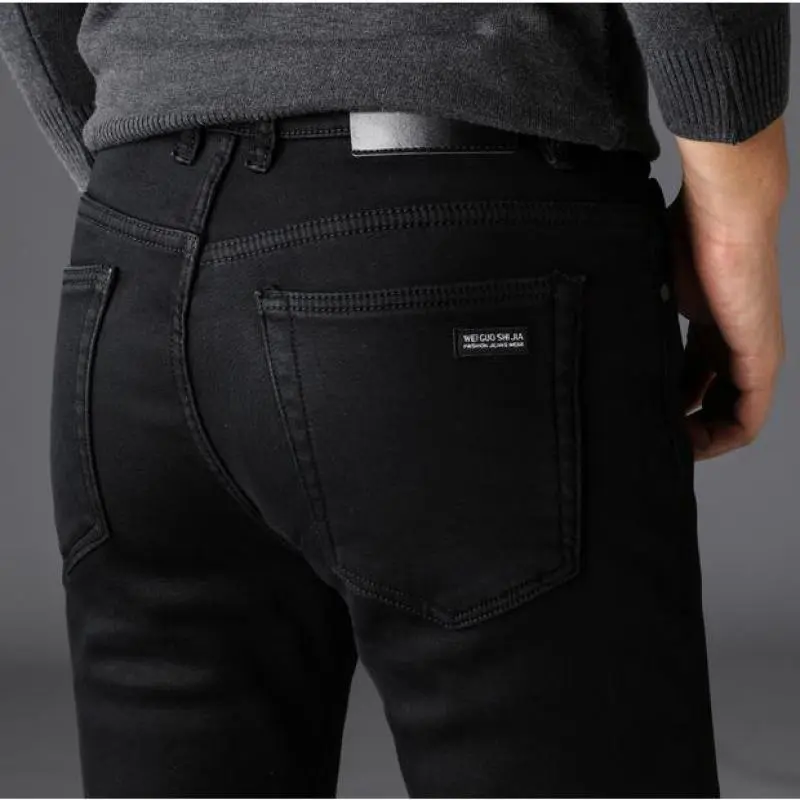 Hommes classique avancé marque de mode Jean Homme Homme doux Stretch noir Biker Masculino Denim pantalon hommes pantalons salopette