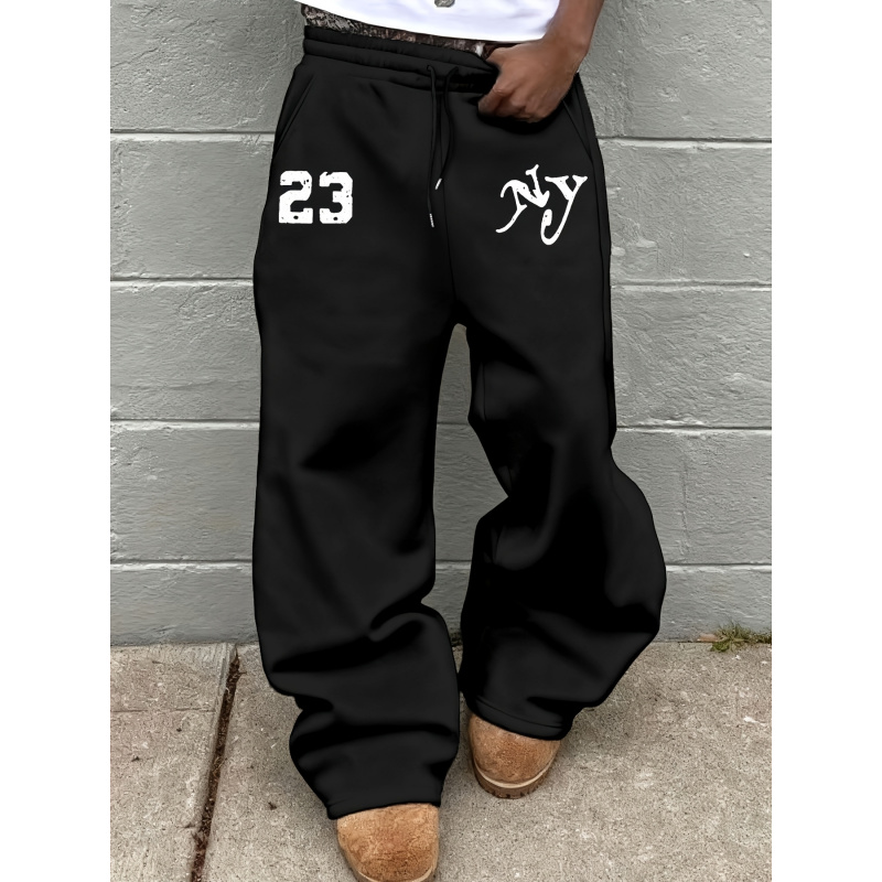 Pantalon de sport pour hommes, avec un motif de lettres unique imprimé, ceinture élastique avec cordon de serrage, très adapté au streetwear