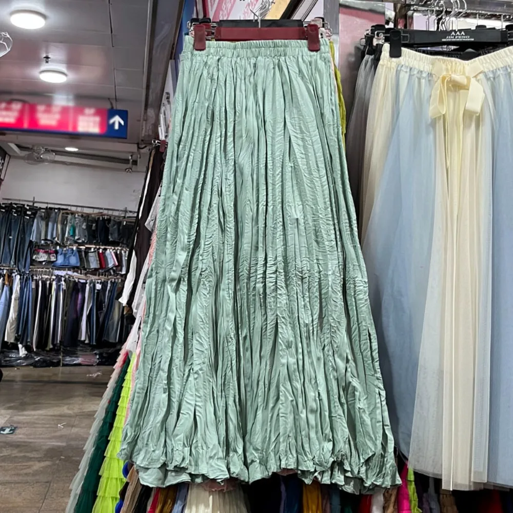 Nouvelles jupes coréennes tendance 2026 pour femmes, taille haute, plis irréguliers, jupe longue plissée en A-line pour filles, polyvalente pour l'automne