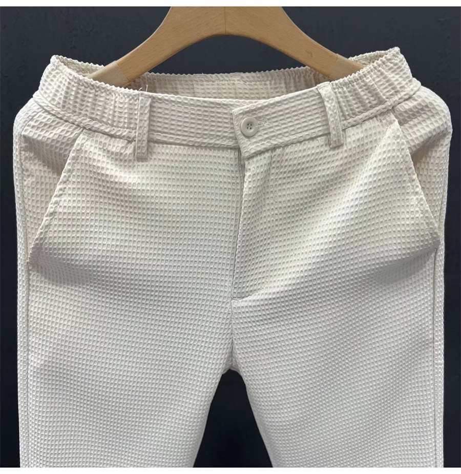 2025 nouveau pantalon de costume solide pour hommes de haute qualité printemps Style coréen poche gaufre crayon pantalon homme d'affaires pantalon décontracté