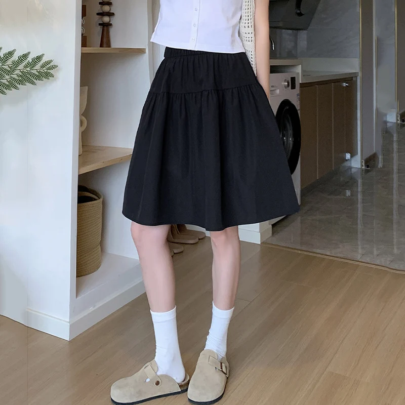 Style collégial ample une ligne jupes femmes été élastique taille haute jupes plissées femme japonais solide au-dessus du genou longueur jupe