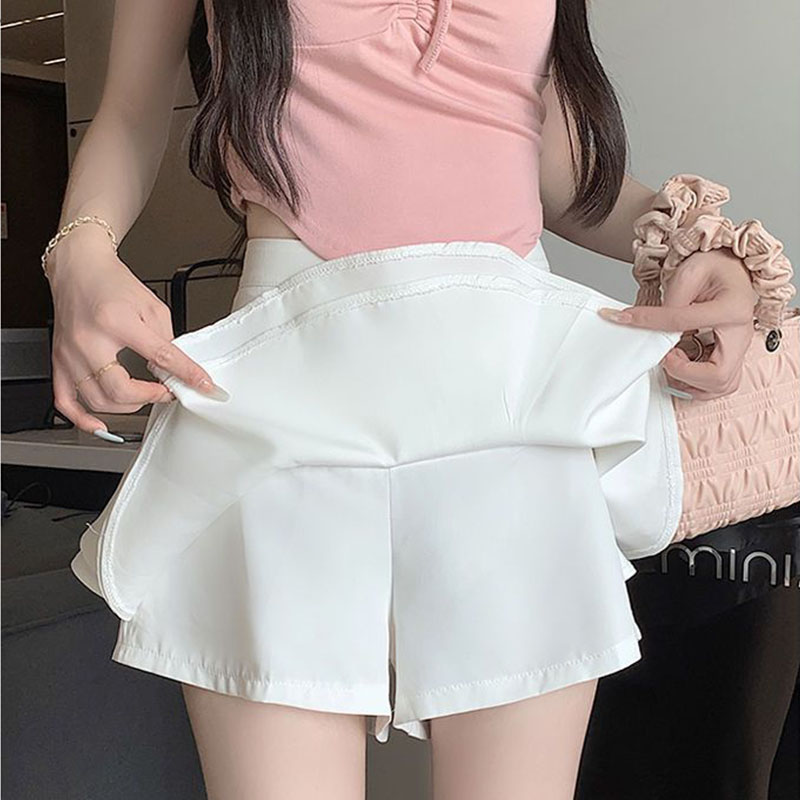 Jupe de bal asymétrique à volants pour femme, mini-jupe coréenne taille haute élégante et sexy, idéale pour l'été, style A-line, couleur unie, passe-partout