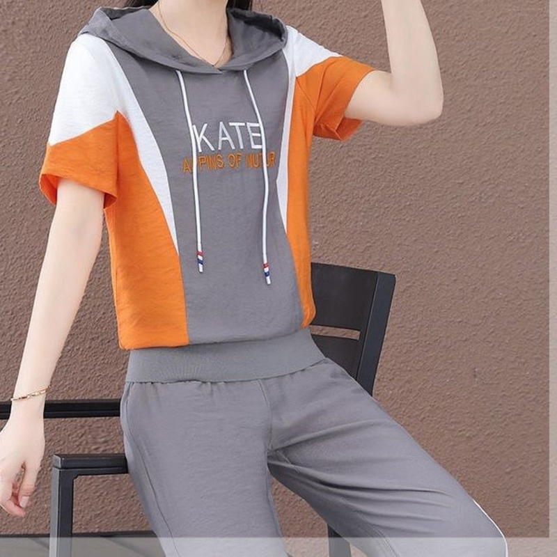 Survêtement de mode pour femmes 2025 printemps été nouveau ensemble deux pièces à capuche manches courtes haut court et pantalon coréen grande taille vêtements