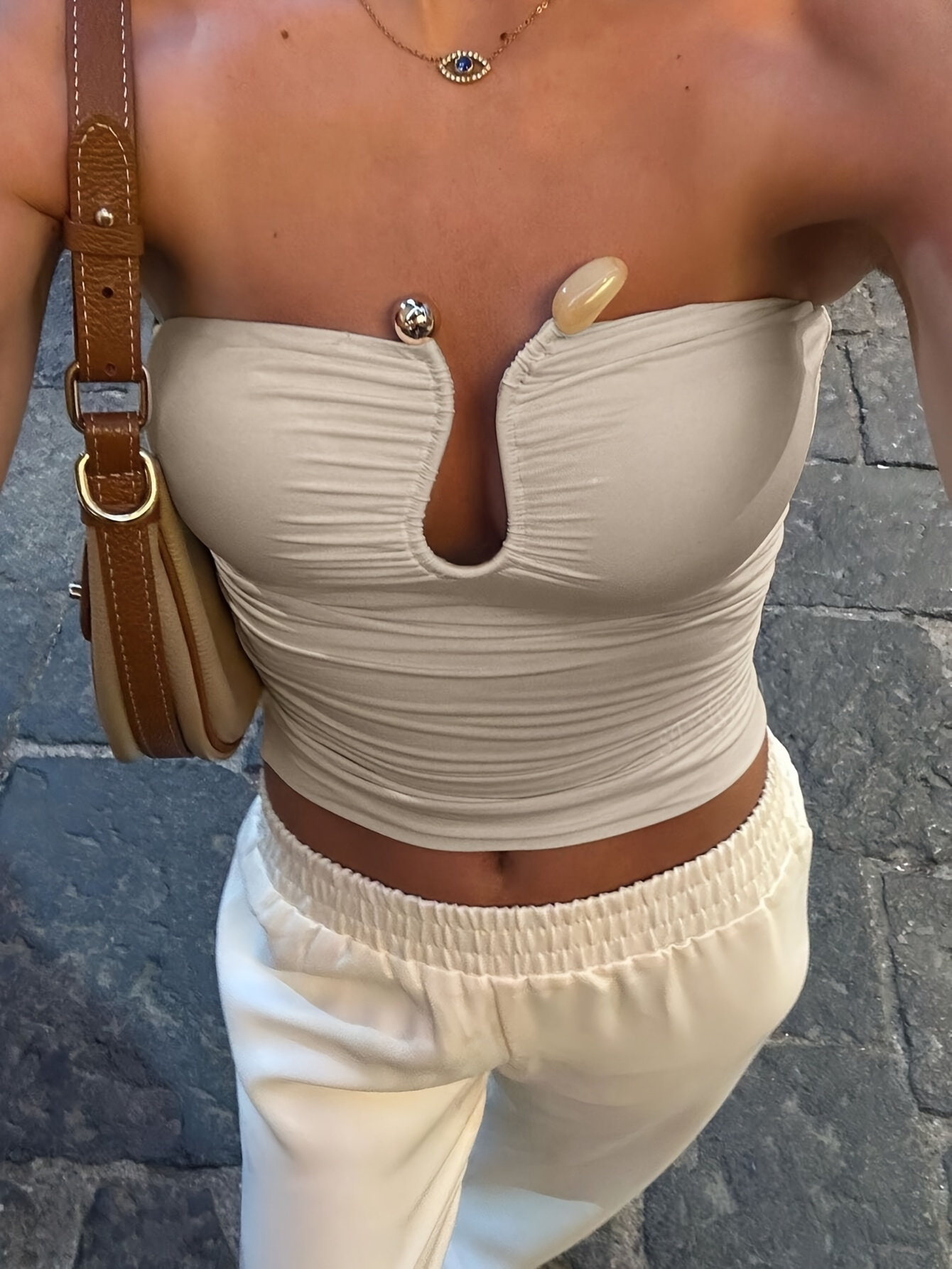 Haut d'été pour femme de couleur unie avec ceinture ajustée, poches et fermeture éclair en U, doté d'un design découpé en forme de goutte d'eau pour un look élégant