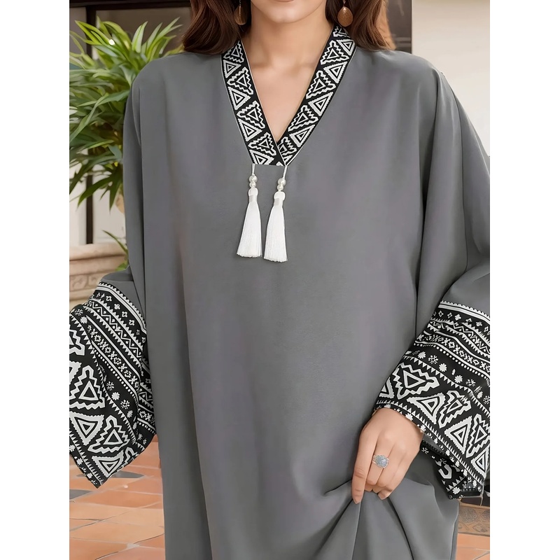 Robe longue décontractée et élégante pour femmes, couleur unie, avec détails en franges, style robe musulmane du Moyen-Orient