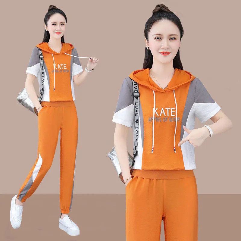 Survêtement de mode pour femmes 2025 printemps été nouveau ensemble deux pièces à capuche manches courtes haut court et pantalon coréen grande taille vêtements