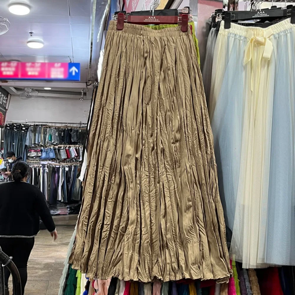 Nouvelles jupes coréennes tendance 2026 pour femmes, taille haute, plis irréguliers, jupe longue plissée en A-line pour filles, polyvalente pour l'automne