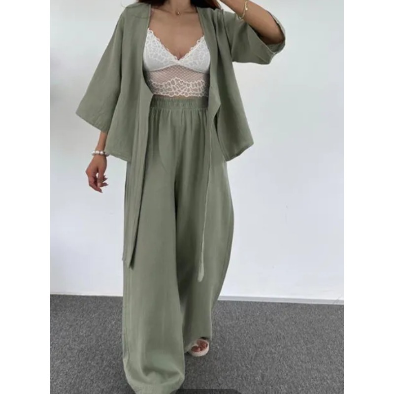 Nouvelle tenue élégante pour femme : costume à col en V qui affine la taille et met en valeur les courbes