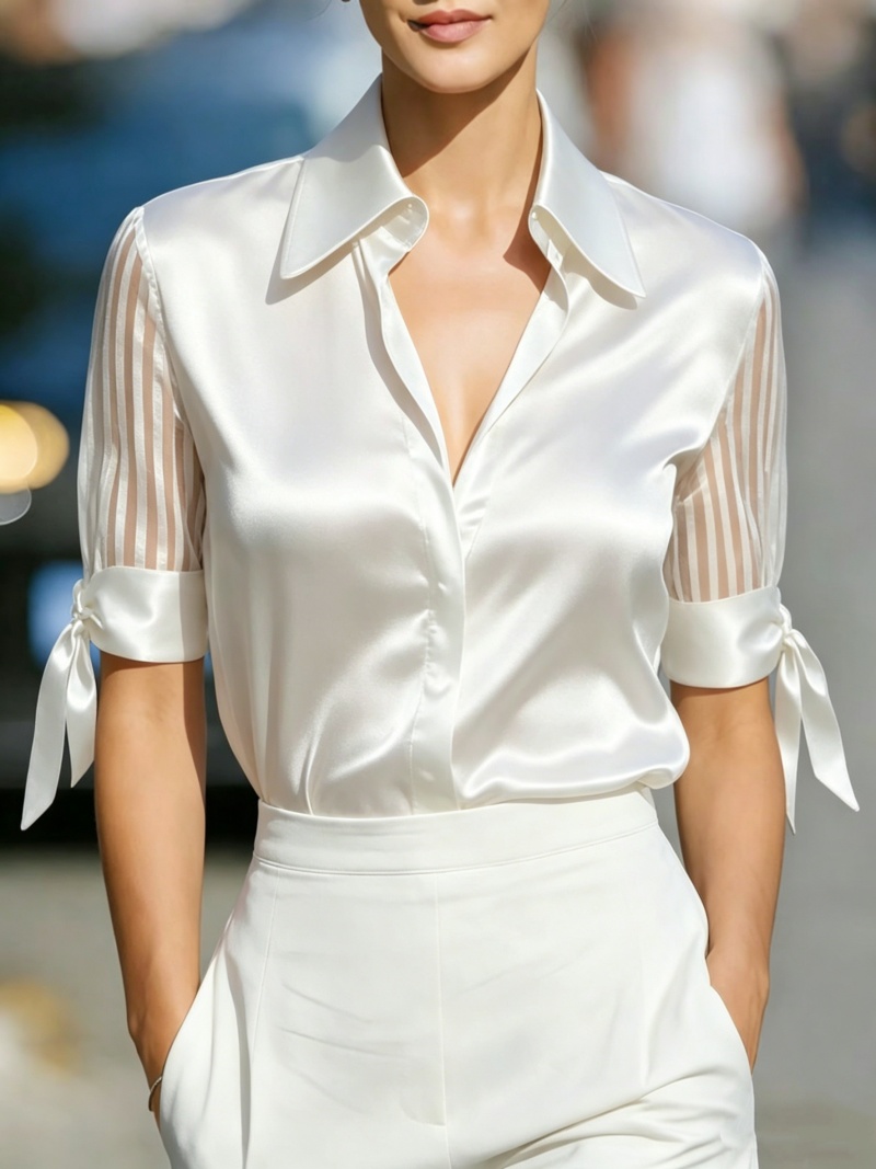 Chemisier en satin pour femme avec panneau transparent rayé et poignets à nœud papillon, élégant, à manches courtes et col en V, idéal pour le bureau, les soirées et le quotidien