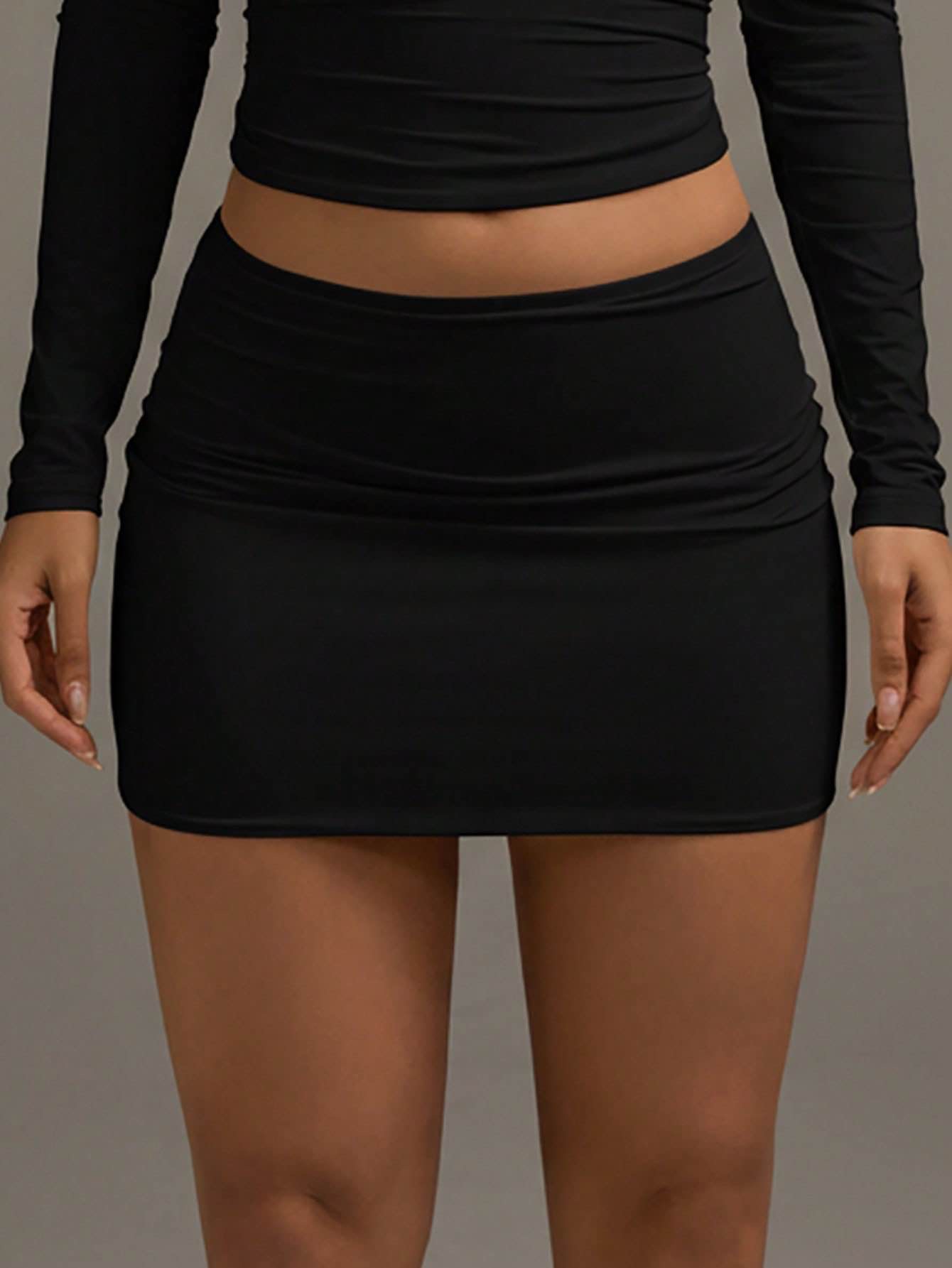 Mini-jupe pour femme, jupe courte élégante noire à taille élastique et moulante