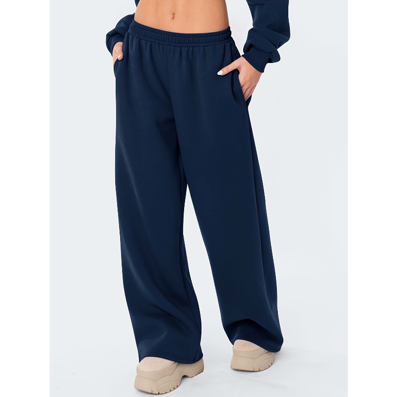 Les pantalons décontractés à jambes larges pour femmes sont chauds et confortables. Les pantalons décontractés d'hiver de couleur unie sont coupe ample