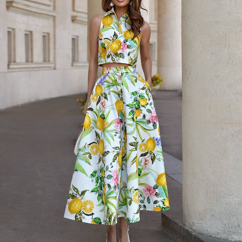 Ensemble deux pièces bohème chic pour femme : haut sans manches à col revers et jupe longue imprimée, idéal pour les fêtes et les vacances d'été