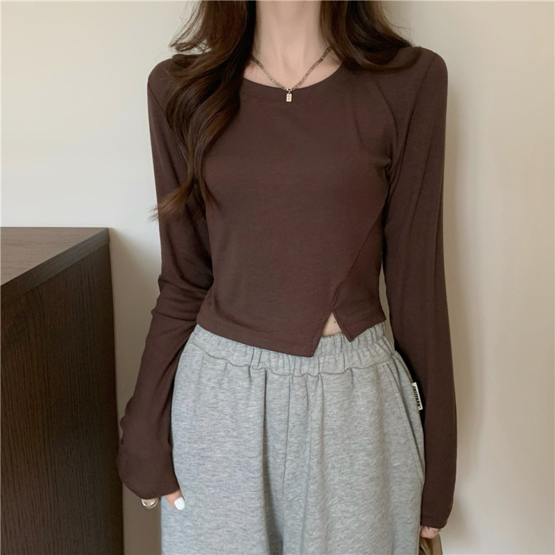 T-shirt pour femmes, vêtement d'automne, col rond, basique, manches longues fendues, couleur unie, t-shirt élégant et ajusté pour étudiantes.
