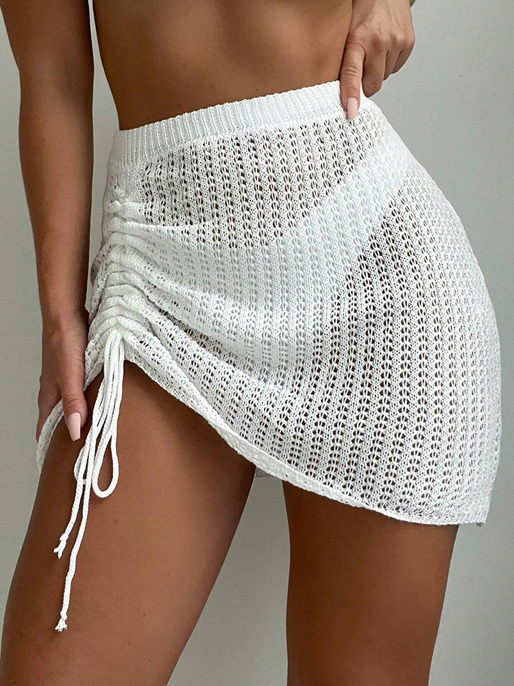 Jupe courte élégante et tendance pour fête au bord de la piscine, avec jupe courte en tricot ajourée à cordon de serrage, pour la plage d'été