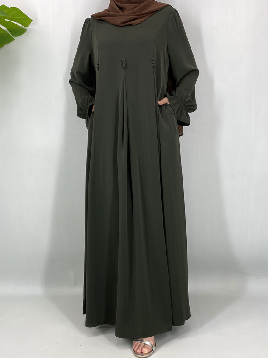 Abaya de style Dubaï modeste, robe maxi islamique tendance pour femmes musulmanes avec détails boutonnés et poches