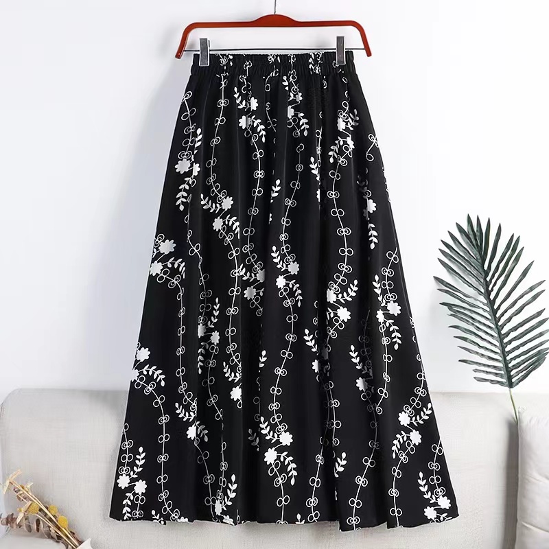 Jupe d'été pour femme en mousseline, style vintage, imprimé floral, taille haute élastique, décontractée, mi-longue, coupe trapèze, pour la plage