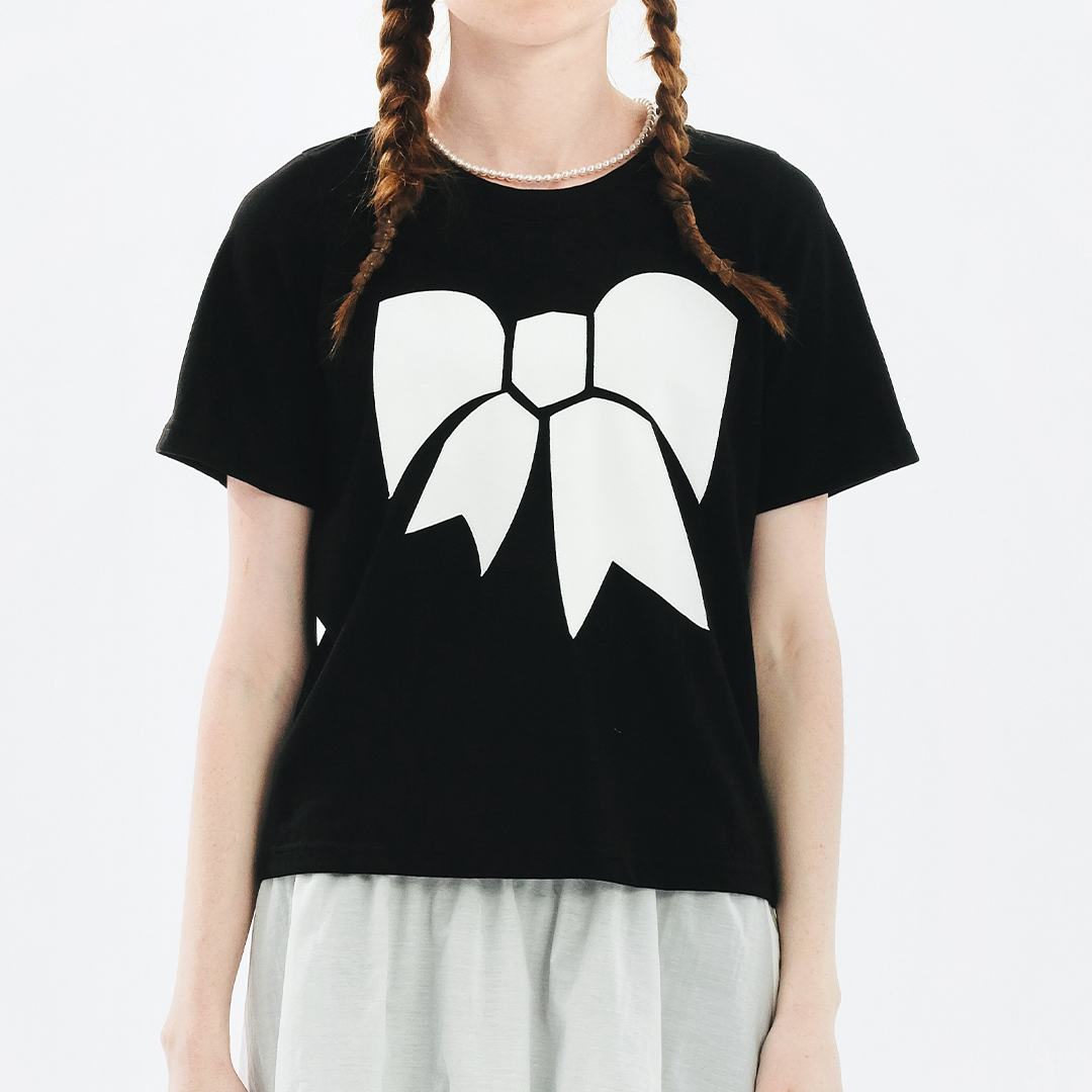 IMAKOKONI Vêtements féminins, t-shirts pour femmes, noir, manches courtes, imprimé nœud blanc, coupe ample, décontracté, haut pour femmes.