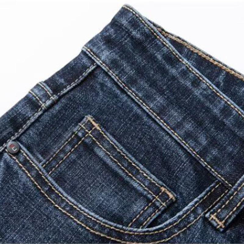 Jean droit extensible pour homme, style vintage, polyvalent, résistant à l'usure, en denim délavé, idéal pour le printemps et l'automne