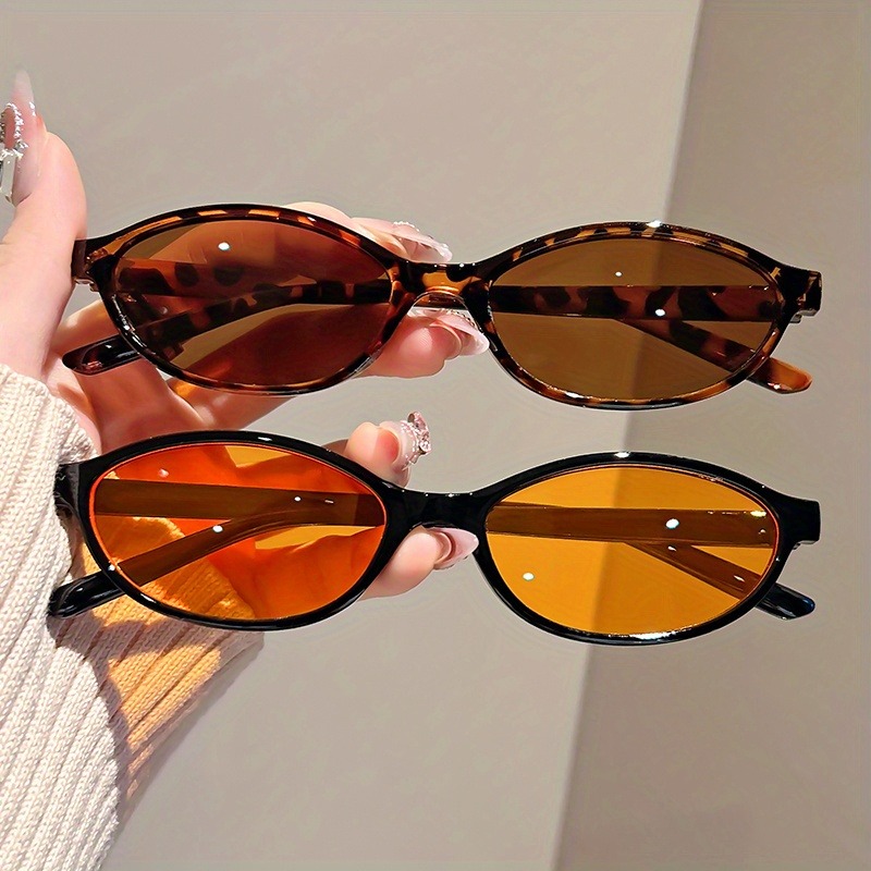 Lunettes ovales rétro pour femmes, accessoire élégant à pression de rue pour la randonnée et les tenues décontractées