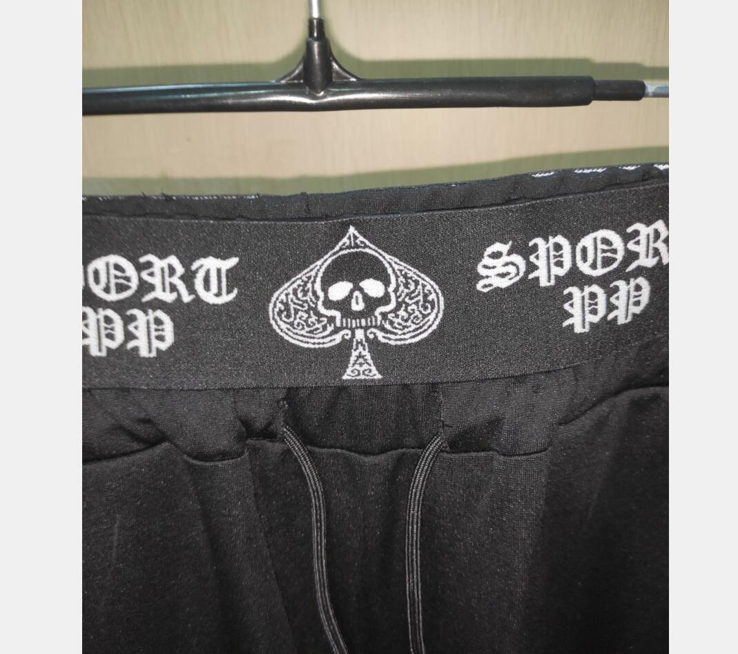 2025 nouveaux pantalons de survêtement pantalons de survêtement hommes coupe ajustée pantalons d'entraînement mâle multi-poches décontracté strass pantalon Design vêtements de sport