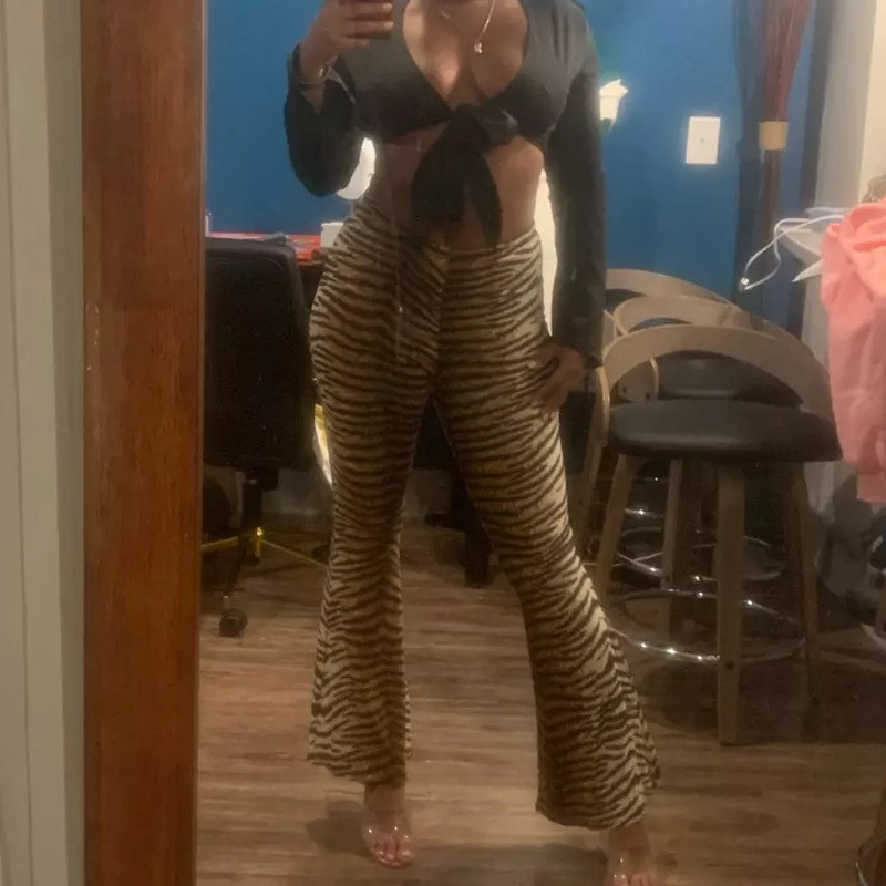 Nouveau pantalon décontracté taille haute, élégant, ajusté, imprimé avec des motifs serpent et jambes évasées.