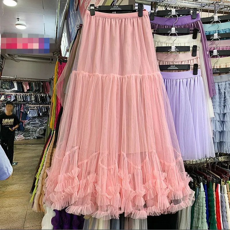 Jupe longue élégante style bohème de plage, taille haute, bouffante, fluide, coupe trapèze, design évasé, en tulle superposé à volants délicats