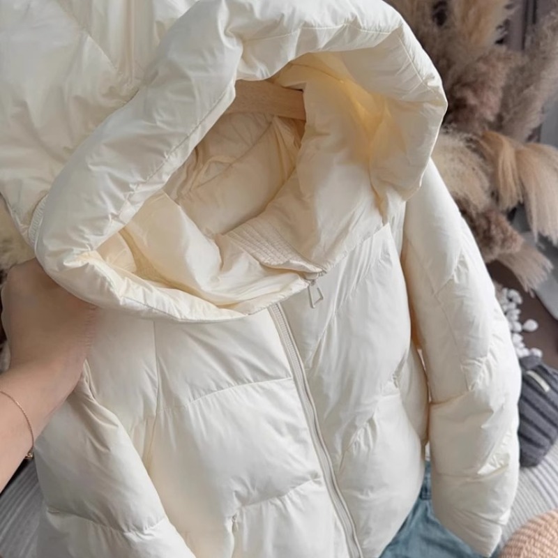 Mode manteau décontracté femmes hiver Style coréen blanc court à capuche doudoune fermeture éclair épais chaud matelassé coupe ample Chic tenue