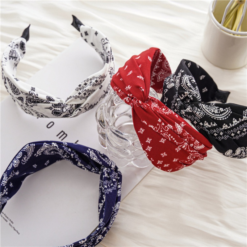 Un nouveau type de bandeau à bords croisés, un bandeau et une épingle à cheveux polyvalents pour femmes en tissu large