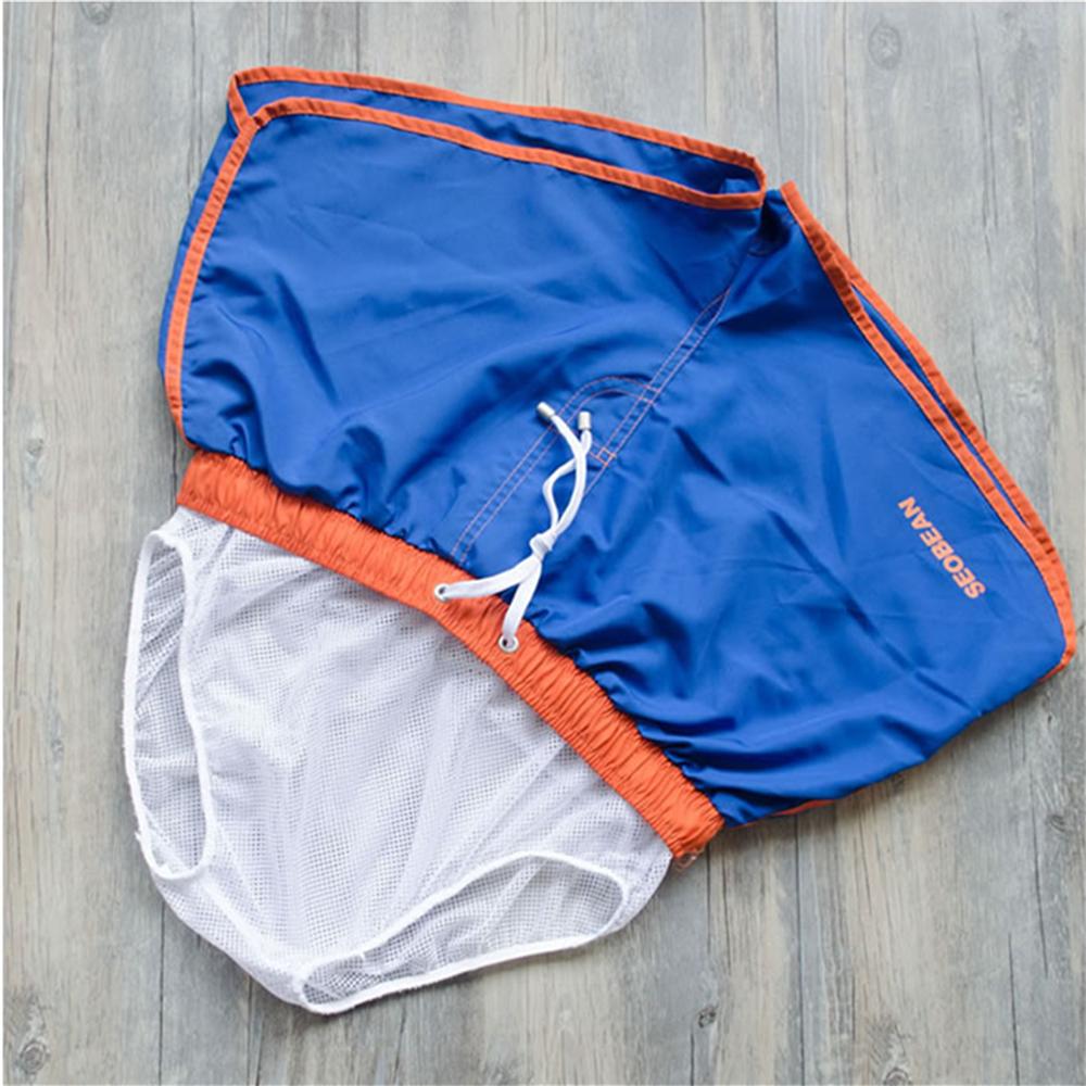 Nouveaux shorts de sport pour hommes et femmes, pantalons de plage, de Shopping, de Fitness, de course, de natation, de basket-ball, d'entraînement de football, multicolores pour adolescents