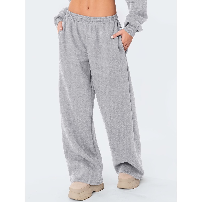 Les pantalons décontractés à jambes larges pour femmes sont chauds et confortables. Les pantalons décontractés d'hiver de couleur unie sont coupe ample
