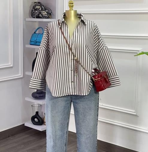 Chemisier femme 2025 printemps automne nouvelle mode col rabattu manches longues coupe ample décontracté couleur unie polyvalent petit haut