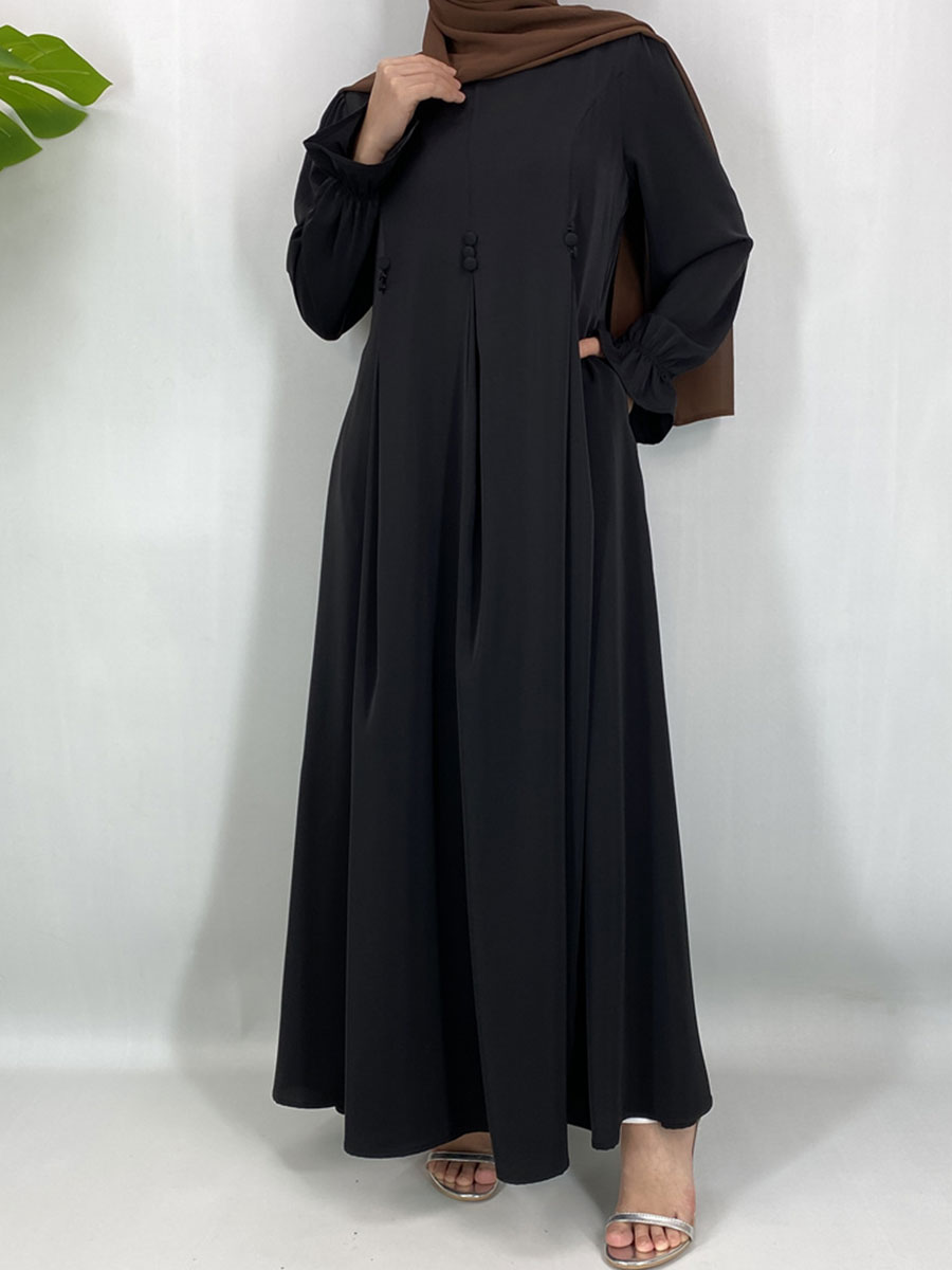 Abaya de style Dubaï modeste, robe maxi islamique tendance pour femmes musulmanes avec détails boutonnés et poches