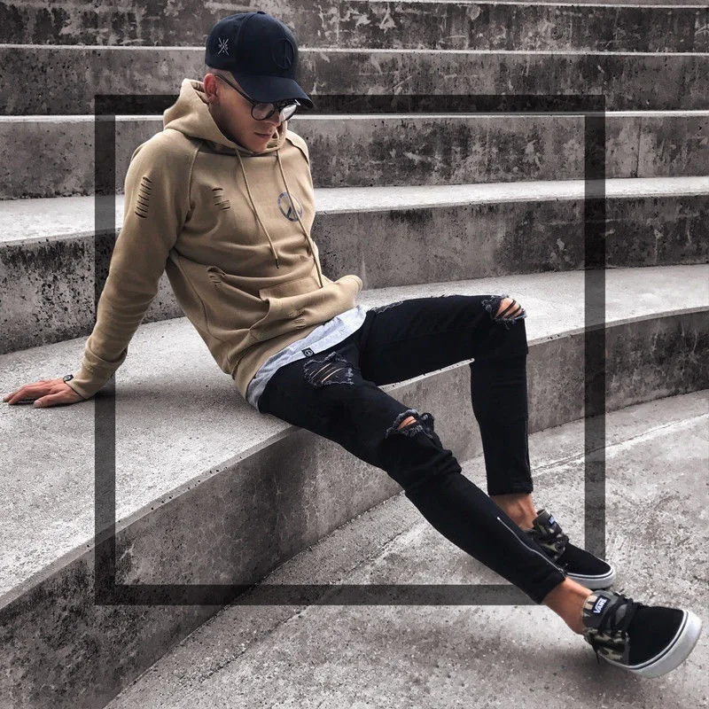 Jeans pour hommes nouveau pantalon tendance noir déchiré avec fermeture éclair extensible pour hommes