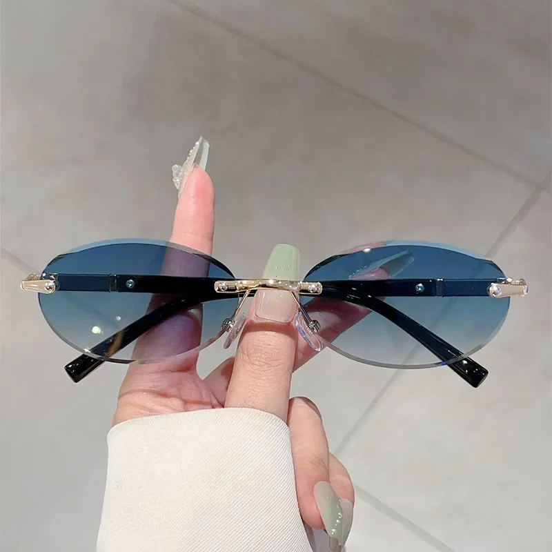Lunettes de soleil en métal haut de gamme pour femmes et hommes, monture ovale personnalisée, rétro, luxueux, sans cadre, pour voyage, UV400