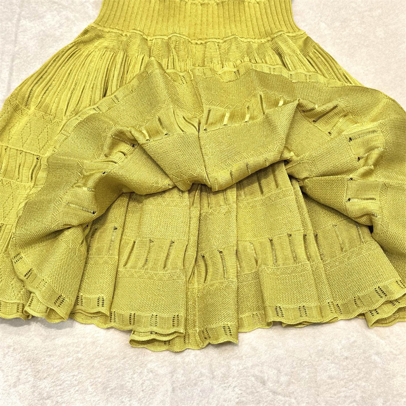 Nouvelle robe décontractée pour femme, mini-robe en maille élastique pour l'été 2026, ajustée à la taille, sans manches, courte, style robe à volants