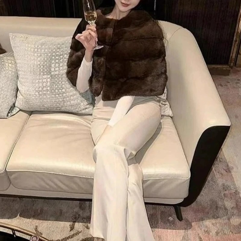 Veste d'hiver femme nouveau en manteaux 2025 automne et hiver nouveau manteau court manteau de fourrure femmes polyvalent court châle fourrure Blouson