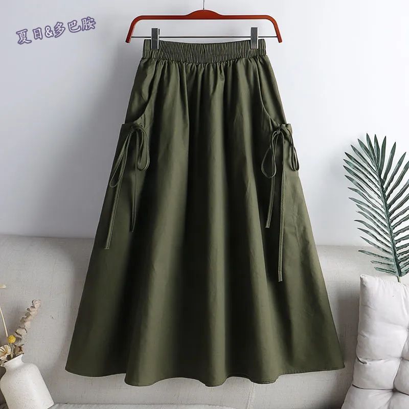 Jupe cargo d'été pour femmes, couleur unie, jupe mi-longue de style coréen avec poches, jupe de travail en forme de A pour étudiantes, jupe cargo pour femmes.