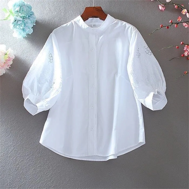 Chemisier femme 2025 printemps été creux lourd broderie dames hauts col montant tempérament dame lâche lanterne manches chemise
