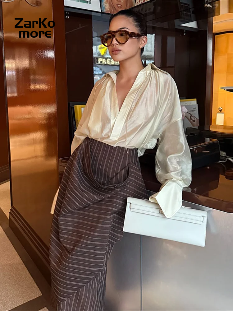 Ensemble chic chemise et jupe pour femme, col à revers ample, décolleté en V profond, manches longues, chemise transparente à lacets, jupes irrégulières à rayures, costumes 2026