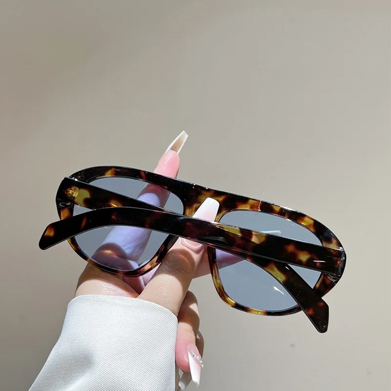Nouvelles lunettes de soleil ovales à motif léopard dégradé pour femmes, lunettes de soleil vintage élégantes pour hommes, verres noirs UV400 pour l'extérieur