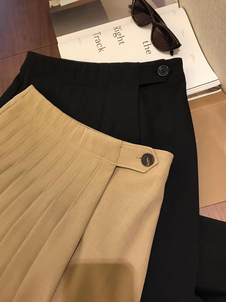Jupe mi-longue plissée à taille haute de couleur unie décontractée pour femmes printemps-automne