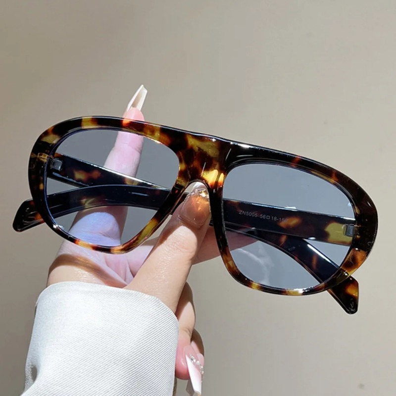 Nouvelles lunettes de soleil ovales à motif léopard dégradé pour femmes, lunettes de soleil vintage élégantes pour hommes, verres noirs UV400 pour l'extérieur