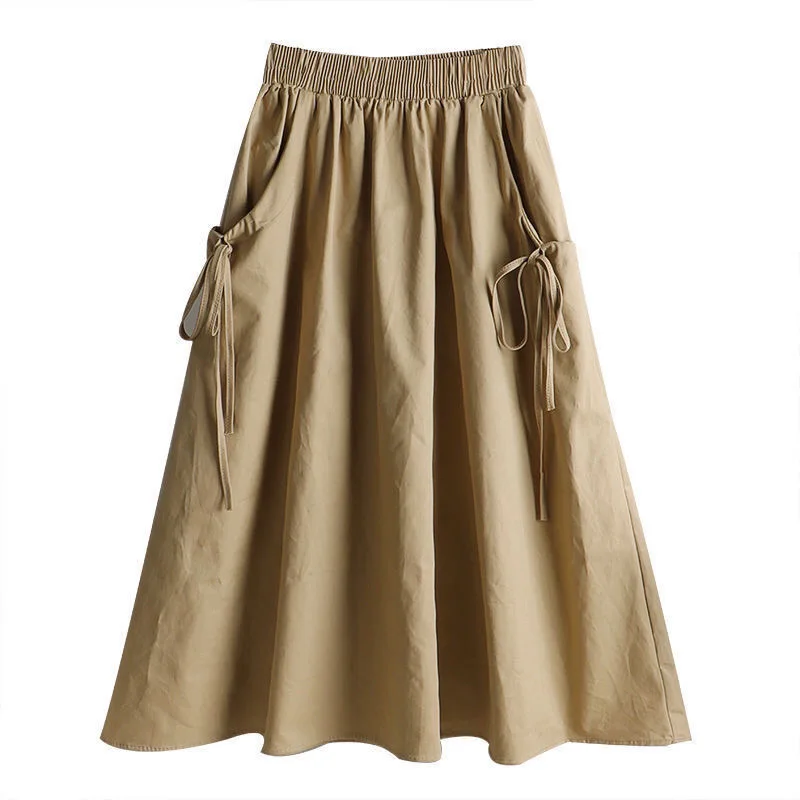 Jupe mi-longue élastique taille haute, style workwear, tendance été 2025, polyvalente, amincissante, avec ceinture et cordon de serrage, poches, longueur midi