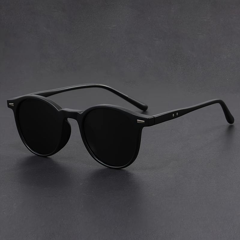 Lunettes de soleil rondes classiques pour hommes et femmes – Monture noire avec accent argenté, verres polarisés UV400, lunettes de soleil de style rétro vintage