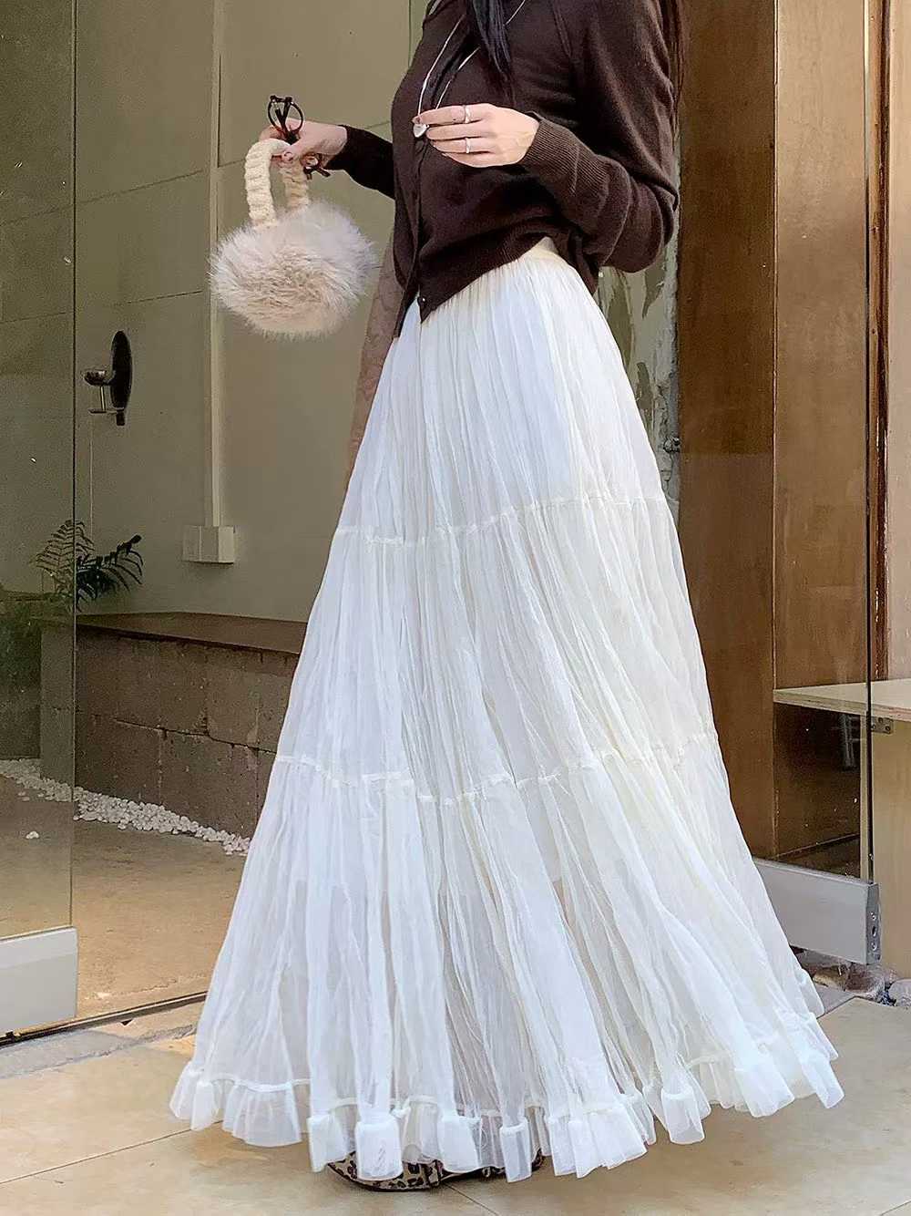 Jupe plissée élégante pour femme avec taille élastique, coupe ajustée, longueur longue, style A, tendance mode printemps 2026