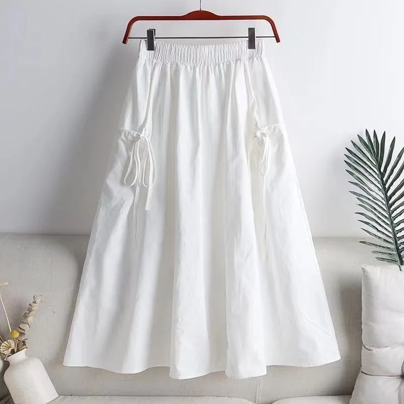 Jupe mi-longue élastique taille haute, style workwear, tendance été 2025, polyvalente, amincissante, avec ceinture et cordon de serrage, poches, longueur midi