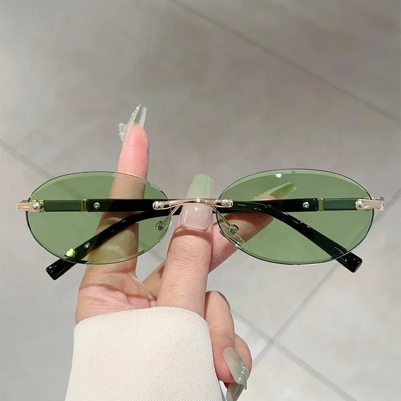 Lunettes de soleil en métal haut de gamme pour femmes et hommes, monture ovale personnalisée, rétro, luxueux, sans cadre, pour voyage, UV400