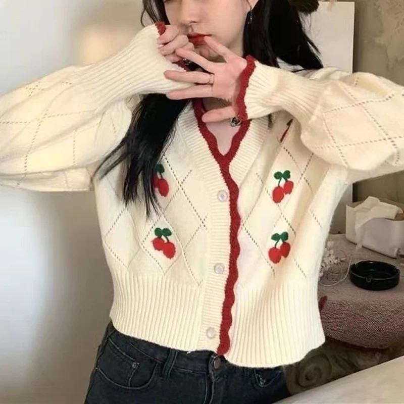 Cardigan tricoté à manches longues et col en v pour femme, haut décontracté, ample, boutons floraux, ajouré, assorti avec tout, nouvelle mode printemps automne
