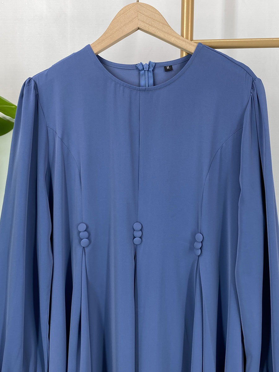 Abaya de style Dubaï modeste, robe maxi islamique tendance pour femmes musulmanes avec détails boutonnés et poches